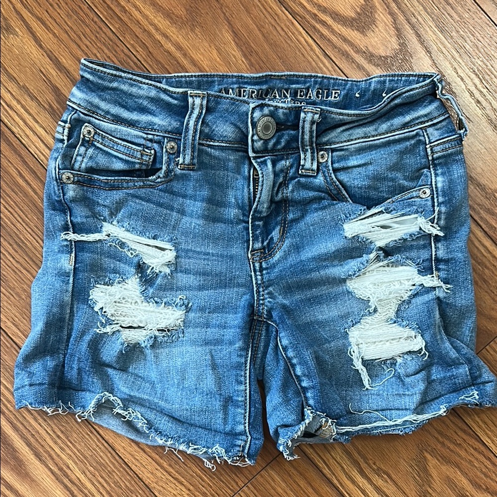 American Eagle Outfitters Women's Blue Denim ripped Shorts  lace pockets sz 4